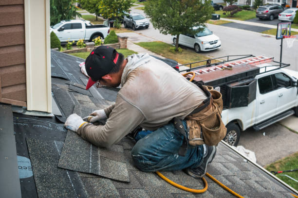 Professional Roofing technician working in Rome, OH